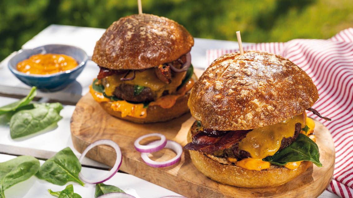 Grilled Beef Burger with Cured Ham in a Lye Bun