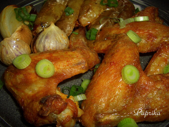 Mexican-Style Chicken Wings Baked on Potatoes with Onion and Garlic
