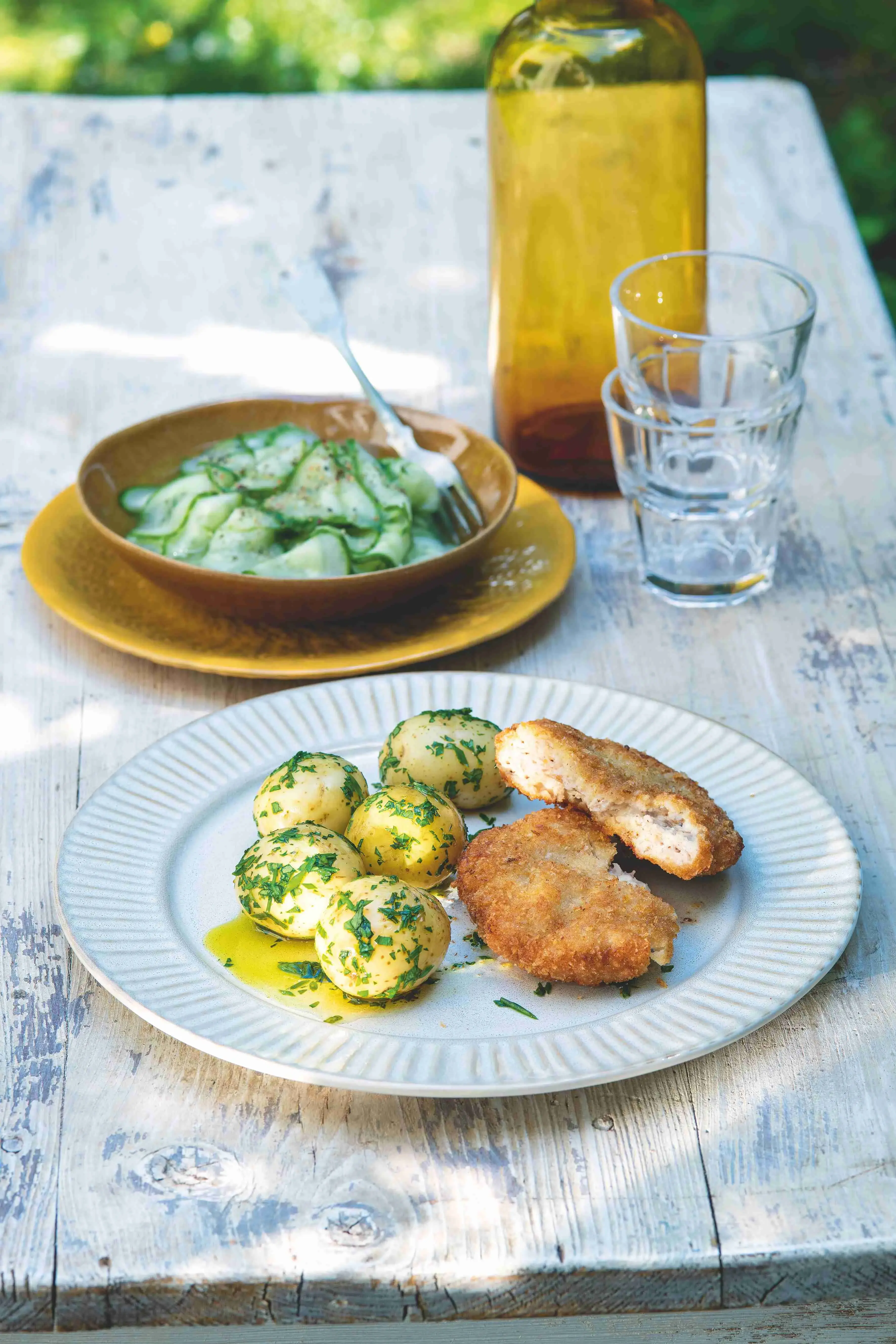Czech Pork and Cheese Patty with Herbed Potatoes and Cucumber Salad