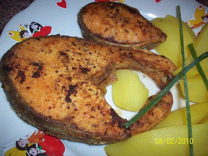 Salmon Fried in Butter with Fish Seasoning and Flour