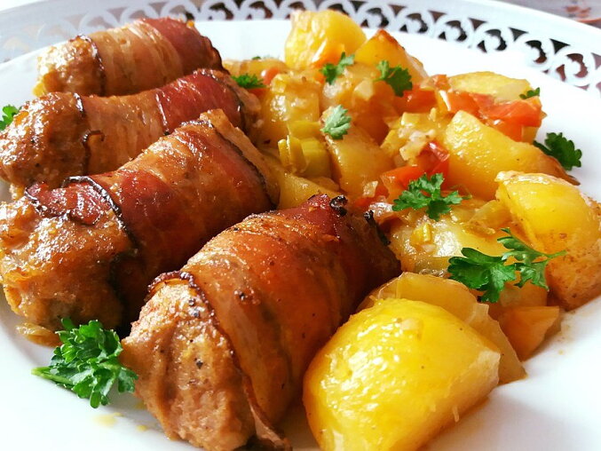 Bacon-Wrapped Meat Rolls Baked on Leek Potatoes