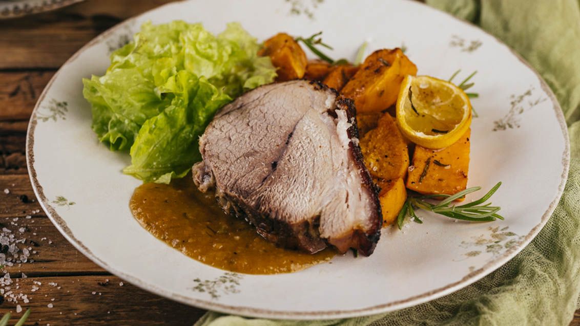 Roast Pork Shoulder with Crackling, Sweet Potatoes and Rosemary Sauce