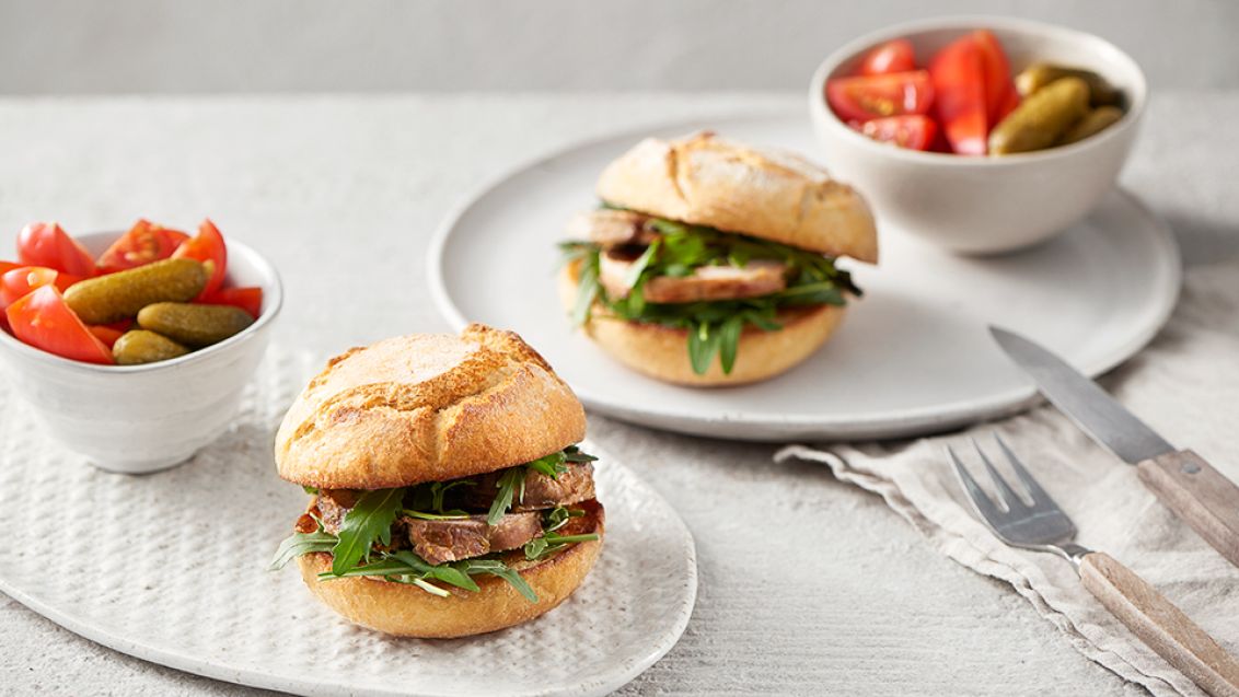 Pesto-Stuffed Pork Shoulder in a Rustic Roll